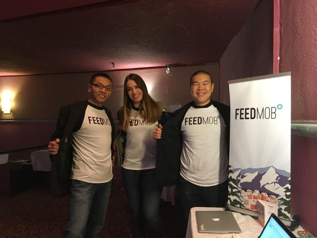 Andrew Tan, Sarah Hawley and Ken Lu wearing FeedMob shirts during the company's early period