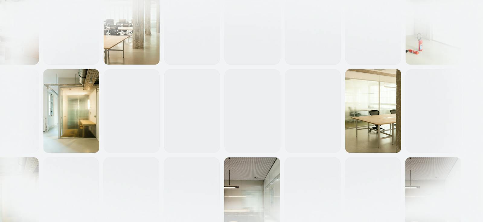 A bright grid-like view through Riot's office showing meeting rooms and work areas
