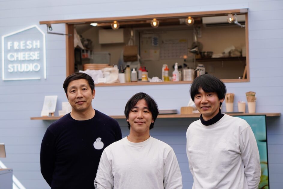 Three members of the FRESH CHEESE STUDIO team outside their shop