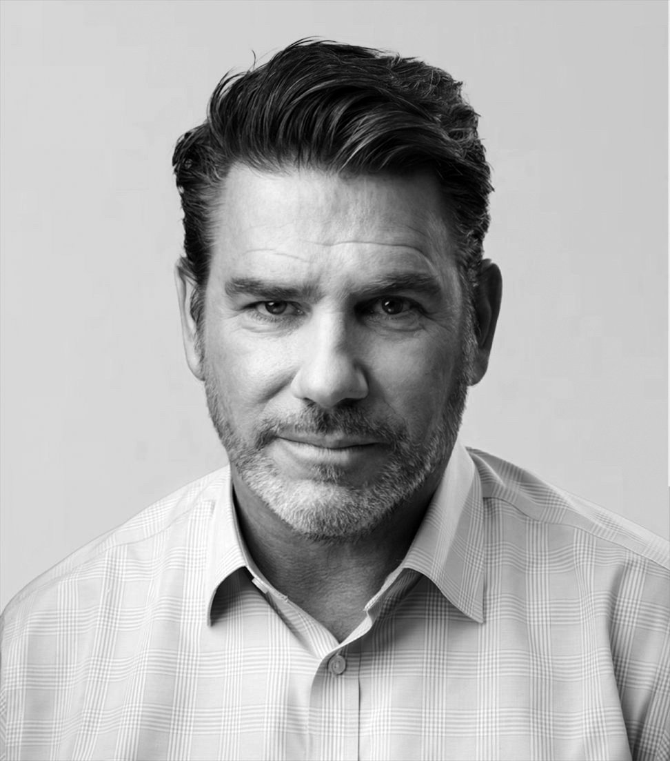 Black-and-white portrait of 104 West founder and CEO Patrick Ward