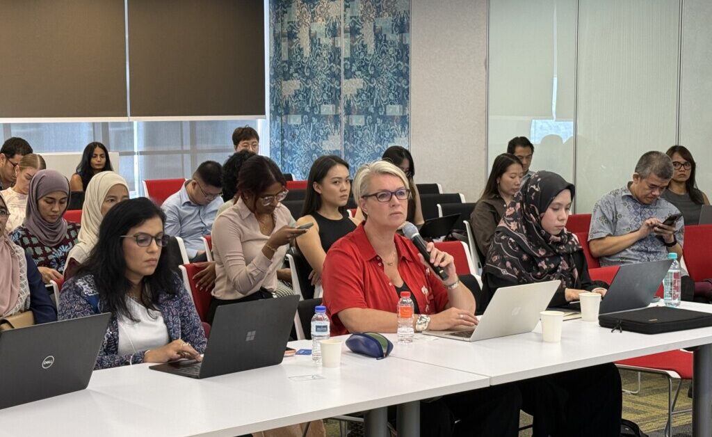 Audience members listening at the INNO4HER 2026 Demo Day