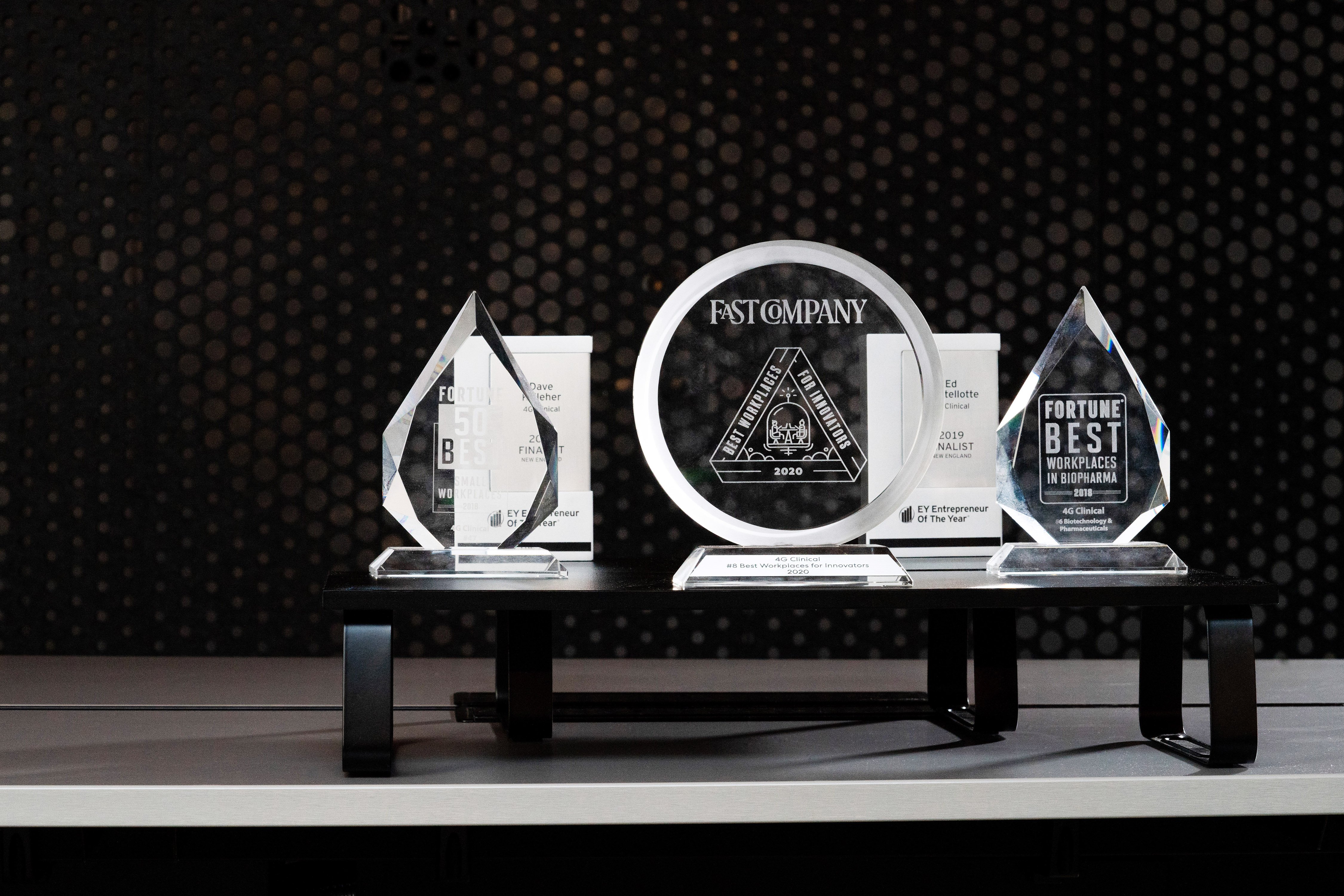 4G Clinical workplace and innovation awards displayed on a shelf