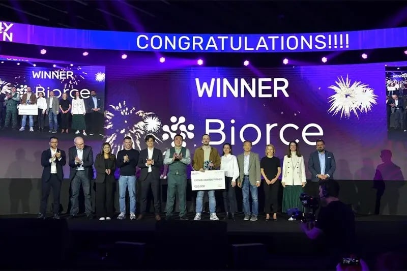 Biorce representatives and event participants onstage with the 2026 4YFN winner cheque