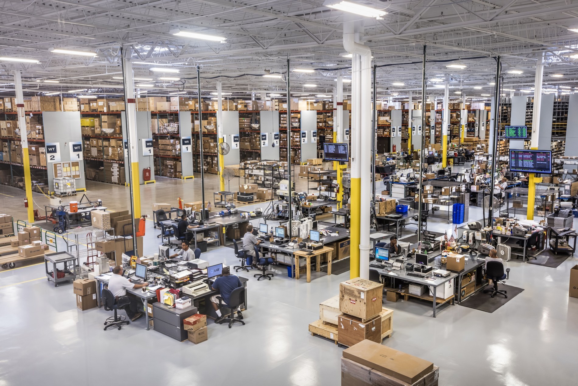 Rows of aircraft parts inventory in an AAR warehouse