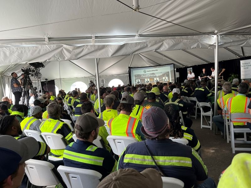 Prattville employees gathered under a tent for a company town hall