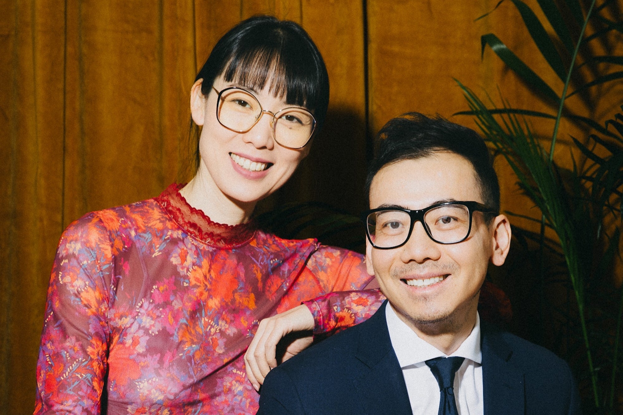Caraa and Mercado Famous co-founders Carmen Chen Wu and Aaron Luo seated together in formal dress