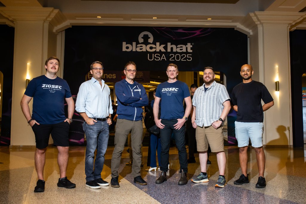 ZioSec team members standing beneath a Black Hat USA 2025 sign