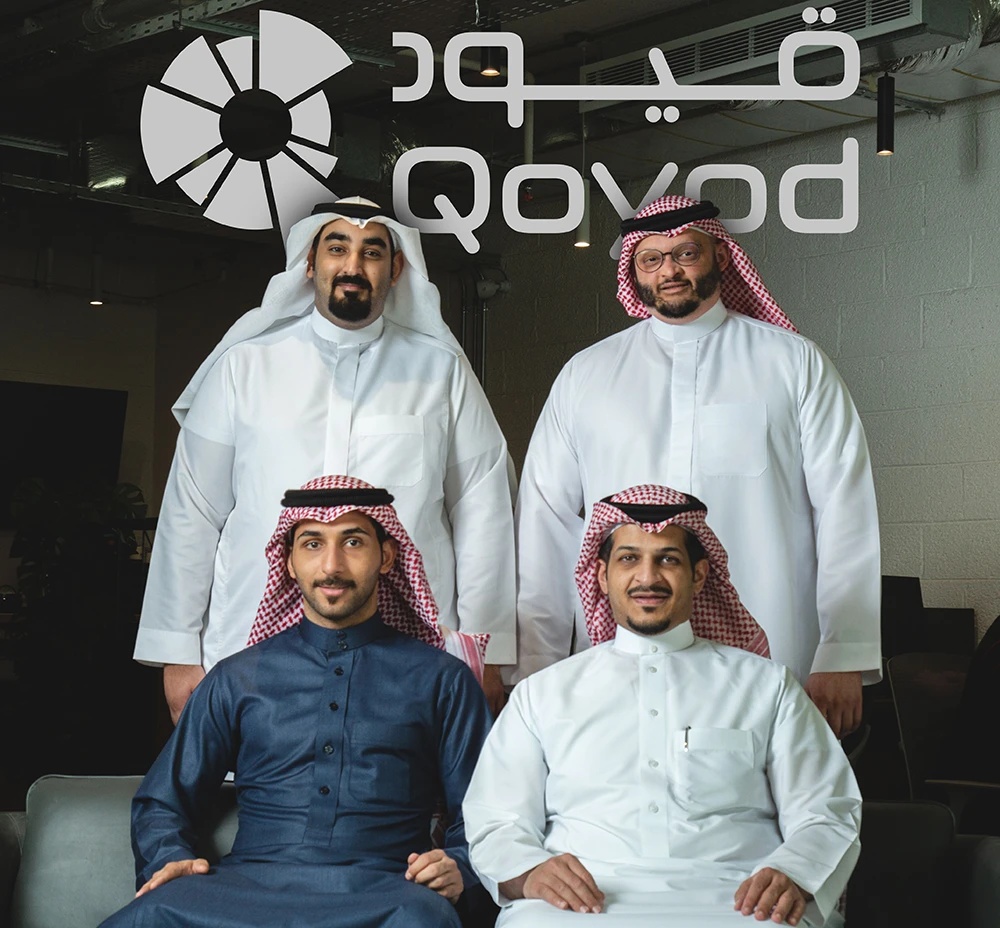 Four members of the Qoyod team, with Abdullah AlDayel seated at right
