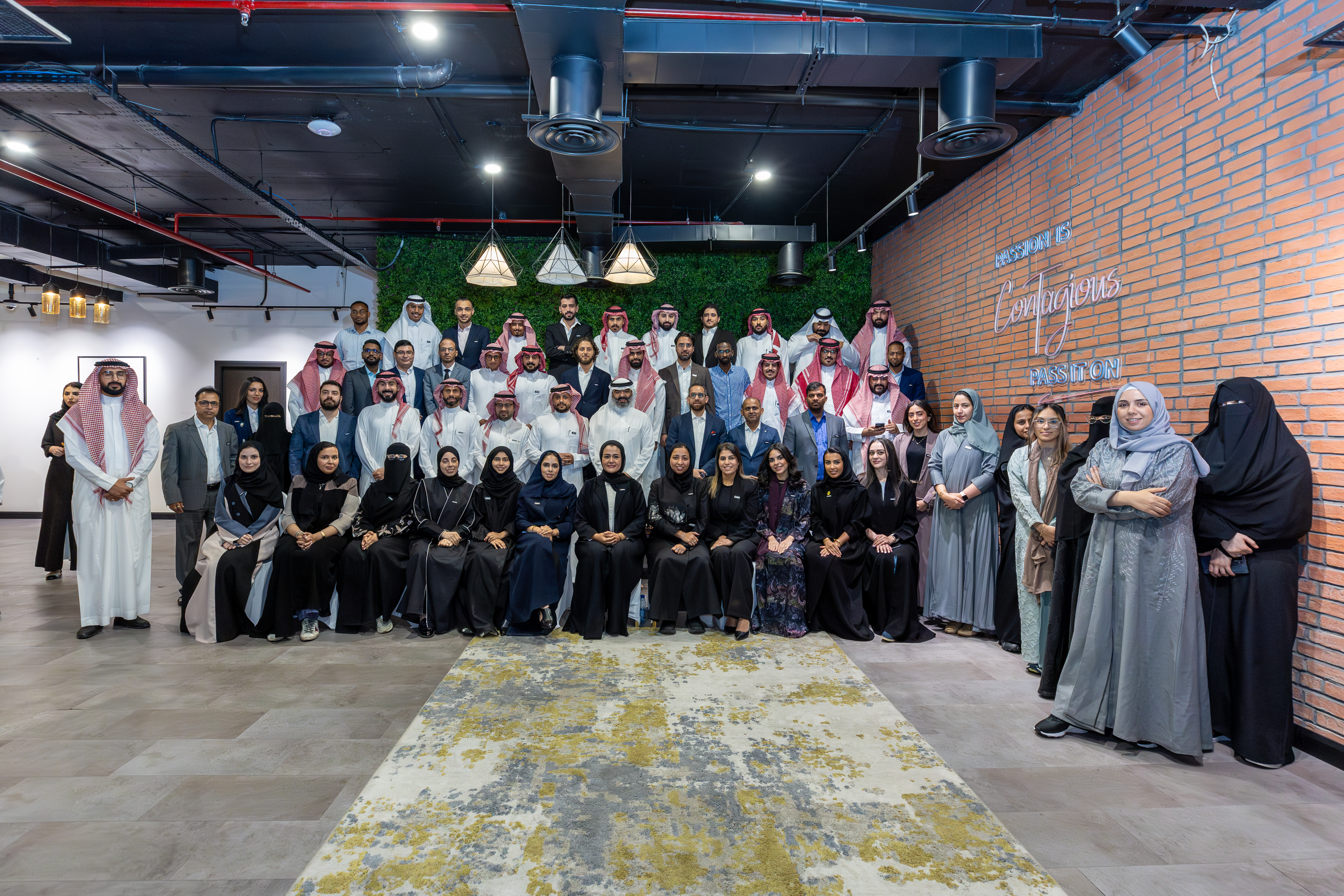 Abdullah Asiri with colleagues at a Lucidya team gathering