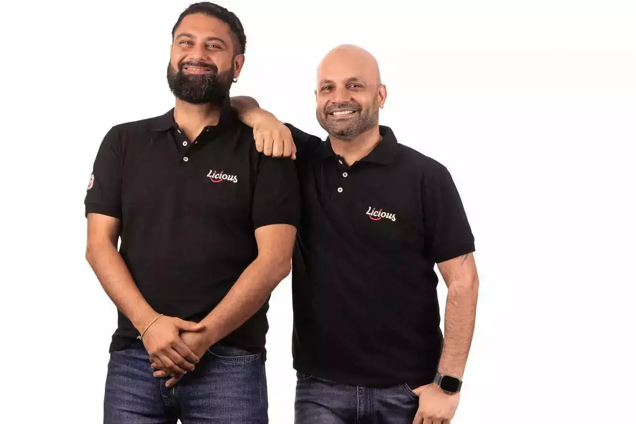 Abhay Hanjura, left, and Vivek Gupta wearing black Licious polo shirts