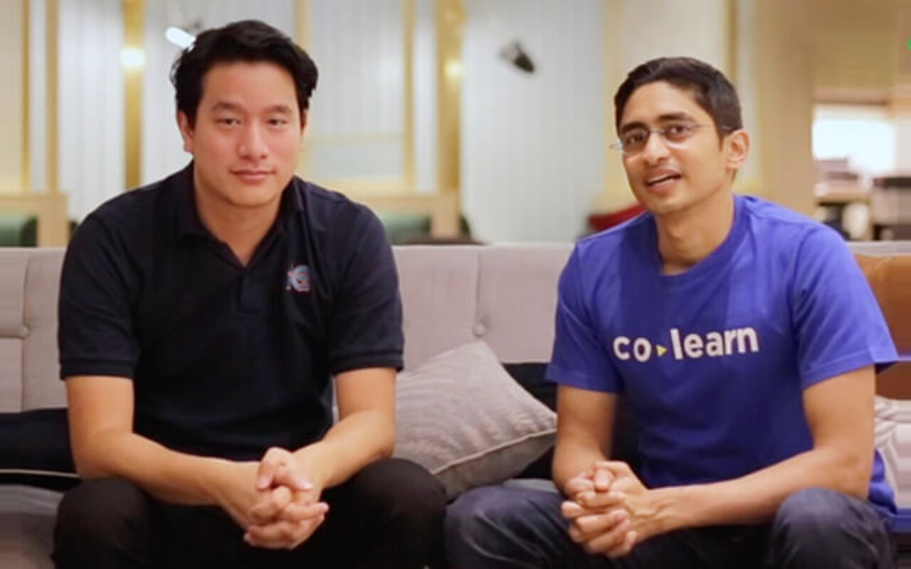 CoLearn co-founders Marc Irawan, left, and Abhay Saboo, right, seated together