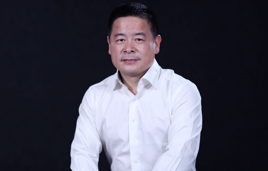 Ablesky founder Lou Yingming in a white shirt against a dark background
