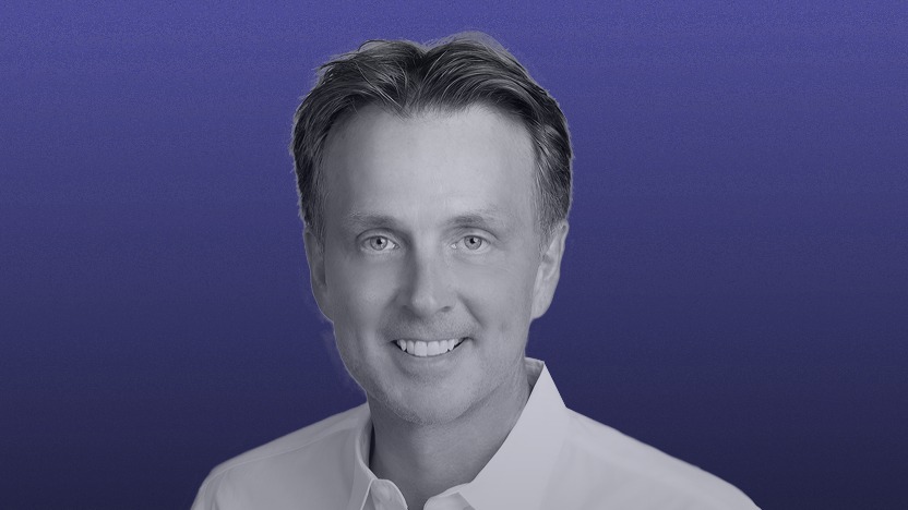 Abra founder and CEO Bill Barhydt against a dark blue background
