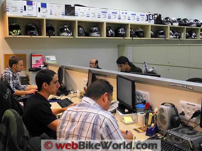 Cardo communication units connected to testing equipment in the company's research and development office