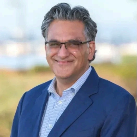 Absolutdata co-founder Anil Kaul in a blue jacket