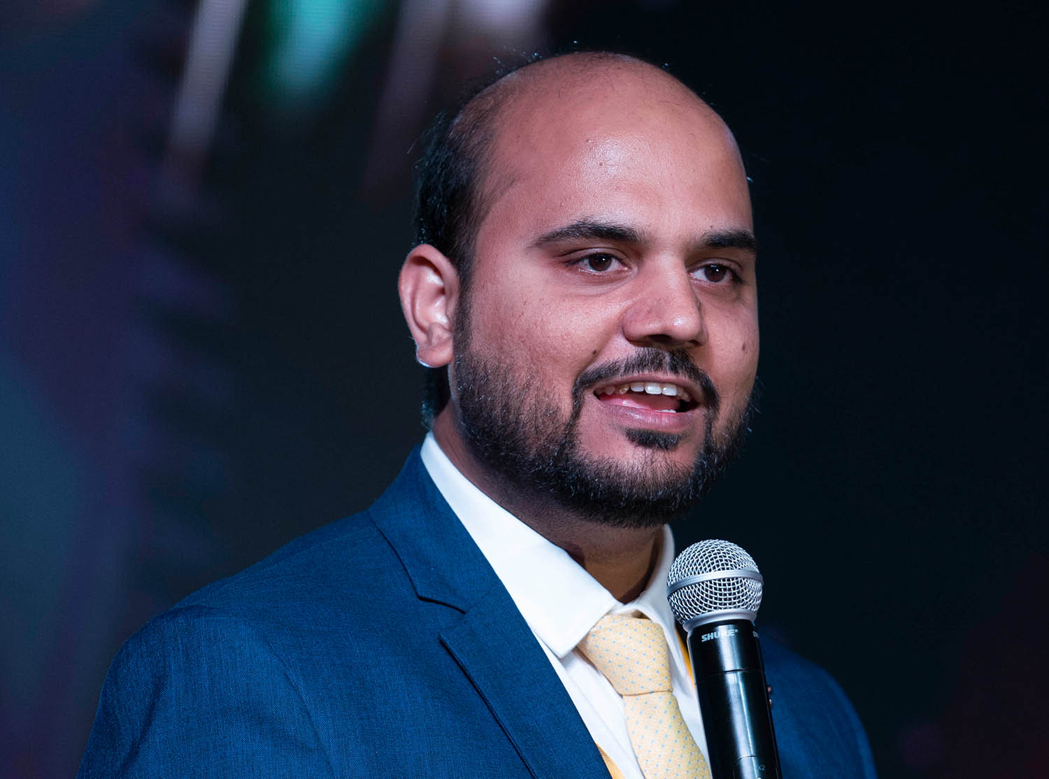 ABSYZ CEO Shubham Khilauria speaking into a microphone