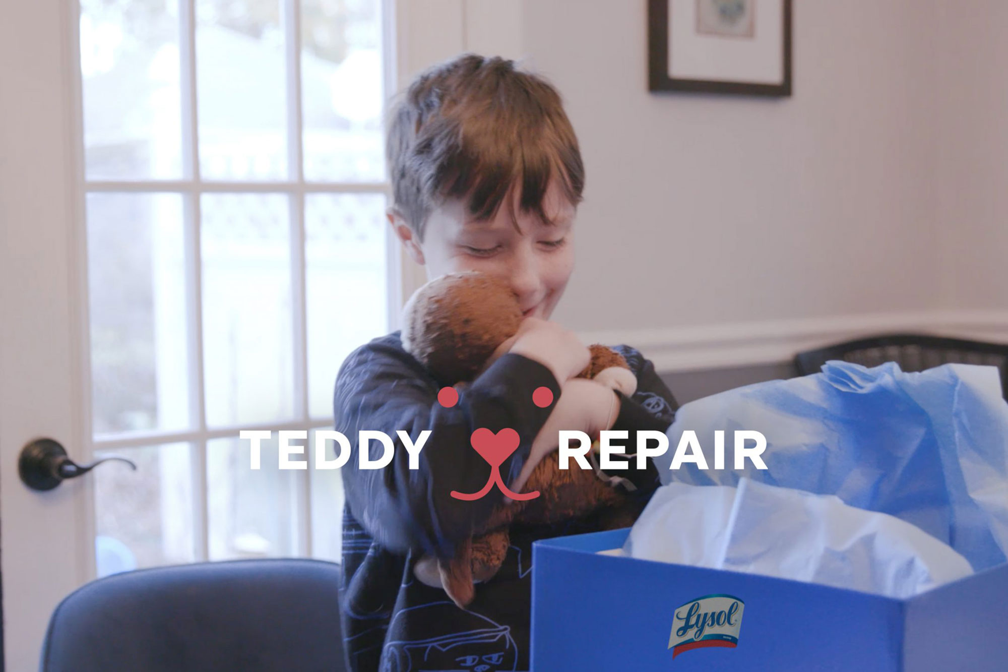 A child hugs a teddy bear in Lysol’s Teddy Repair campaign