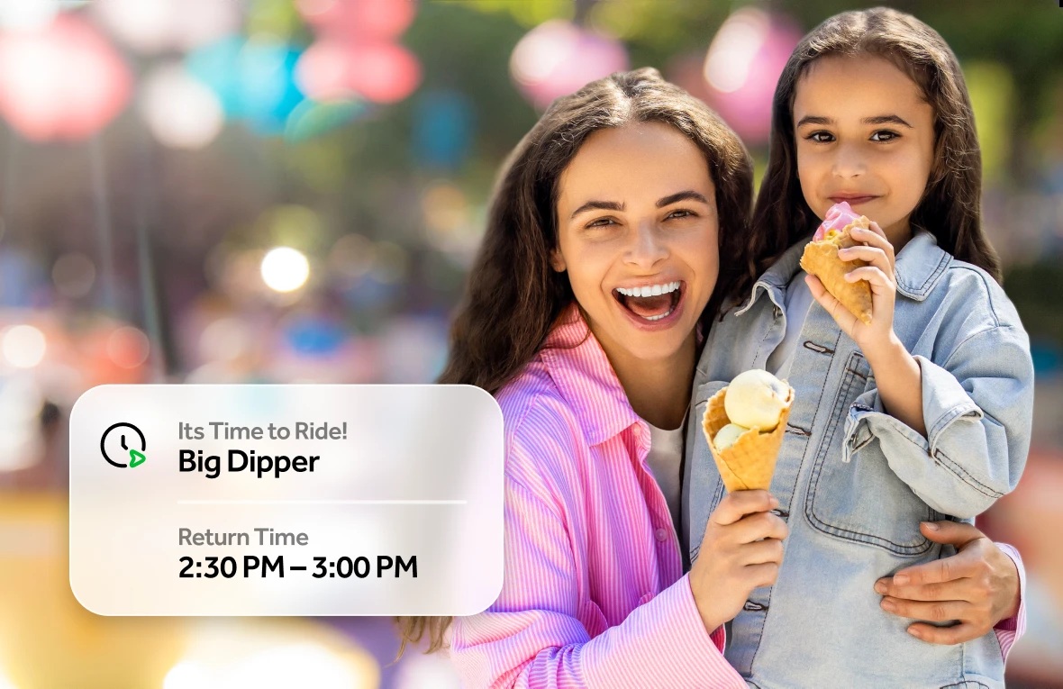 accesso promotional photograph of a mother and child eating ice cream, with a ride return-time notification