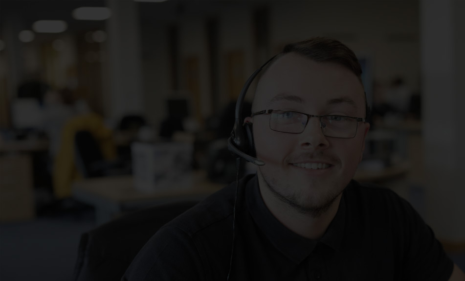 A headset-wearing colleague pictured on AX’s About page