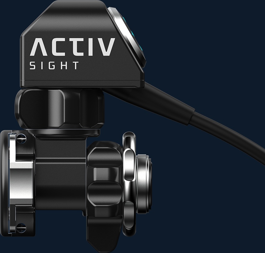 Manufacturer render of the ActivSight imaging module attached to a surgical camera and scope