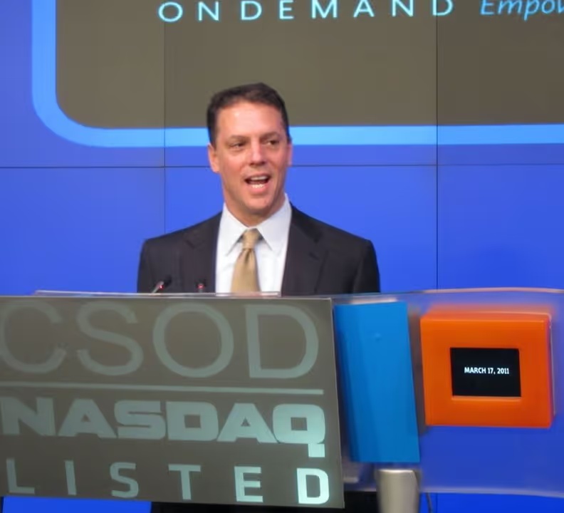 Adam Miller speaking at the Nasdaq podium during Cornerstone's March 17, 2011 listing