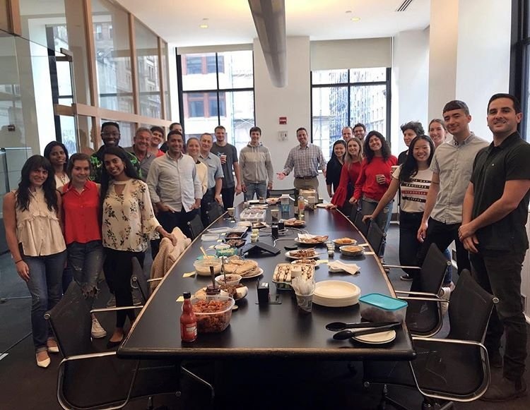 The VirtualHealth team, with Adam Sabloff standing at the center