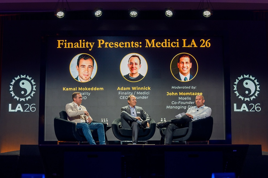 Kamal Mokeddem, Adam Winnick, and John Momtazee seated onstage at Medici LA 26