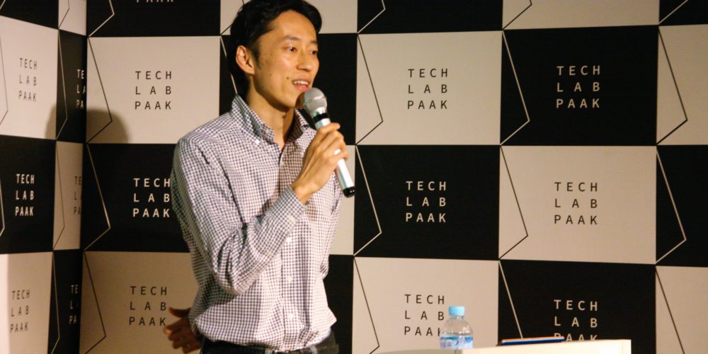 addlight founder Tadaaki Kimura speaking into a microphone at Tech Lab Paak