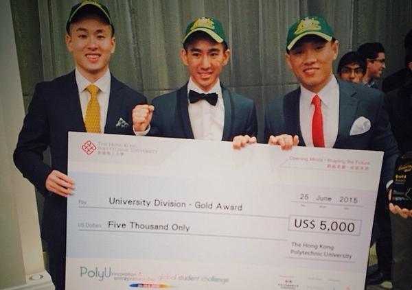 Ryan Chen, Daniel Liang and Aengus Tran holding their 2015 competition prize