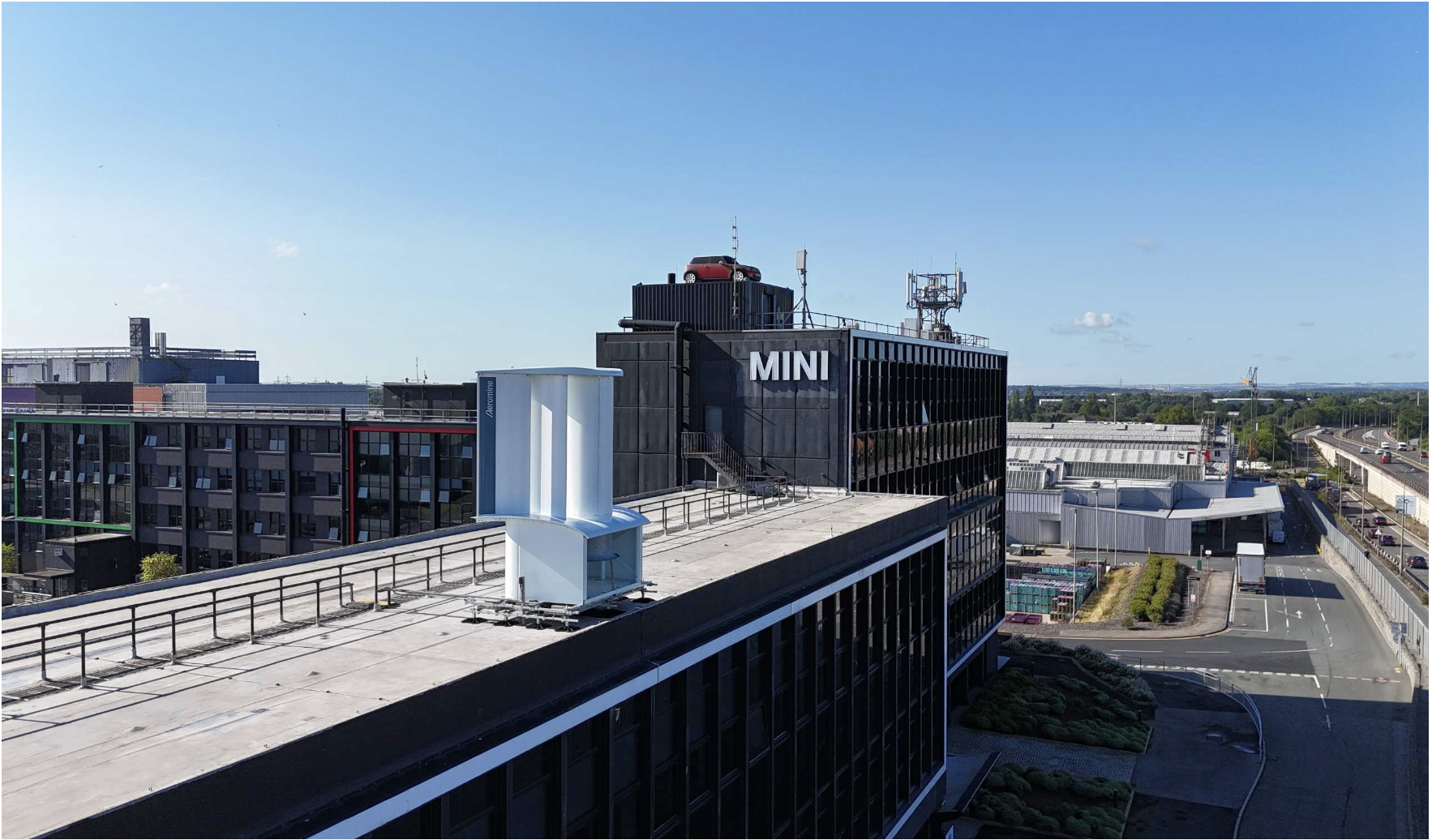 Aeromine motionless wind units installed along the roof edge at the BMW Group MINI plant