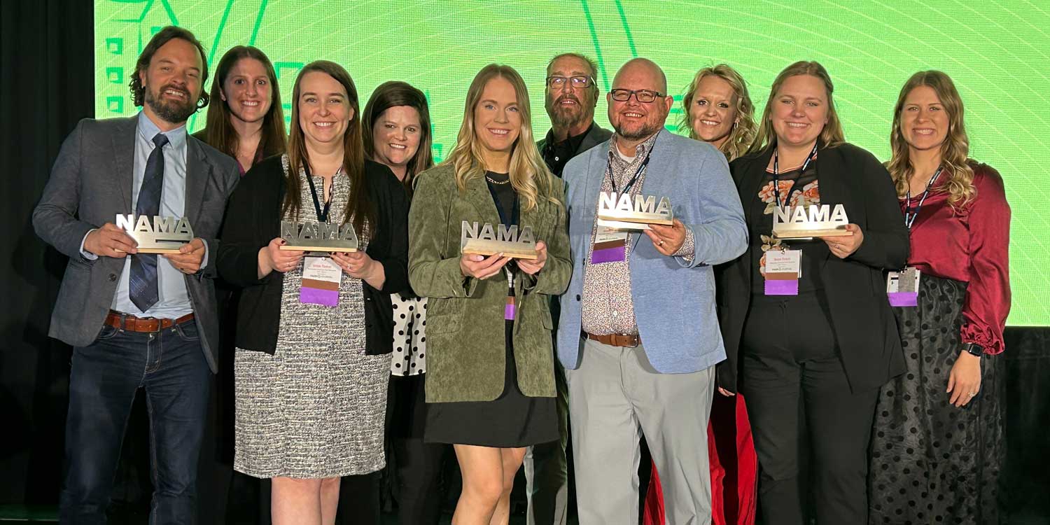 Ag Management Solutions team members at an agricultural marketing awards event