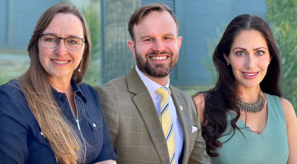 Agave Strategy founders Kate Tice, Charles Siler and Dawn Penich standing together