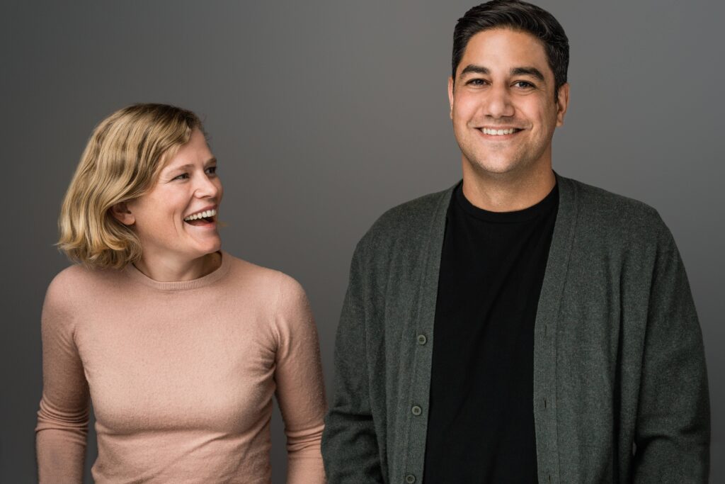 AgentSync co-founders Jenn Knight and Niji Sabharwal standing together