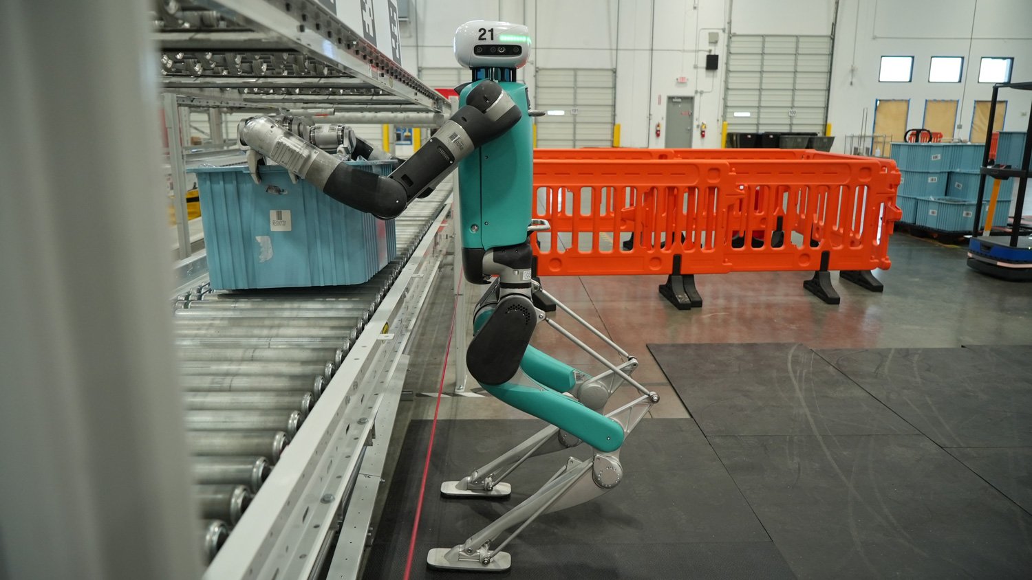 Digit robot working with totes and conveyor equipment at GXO