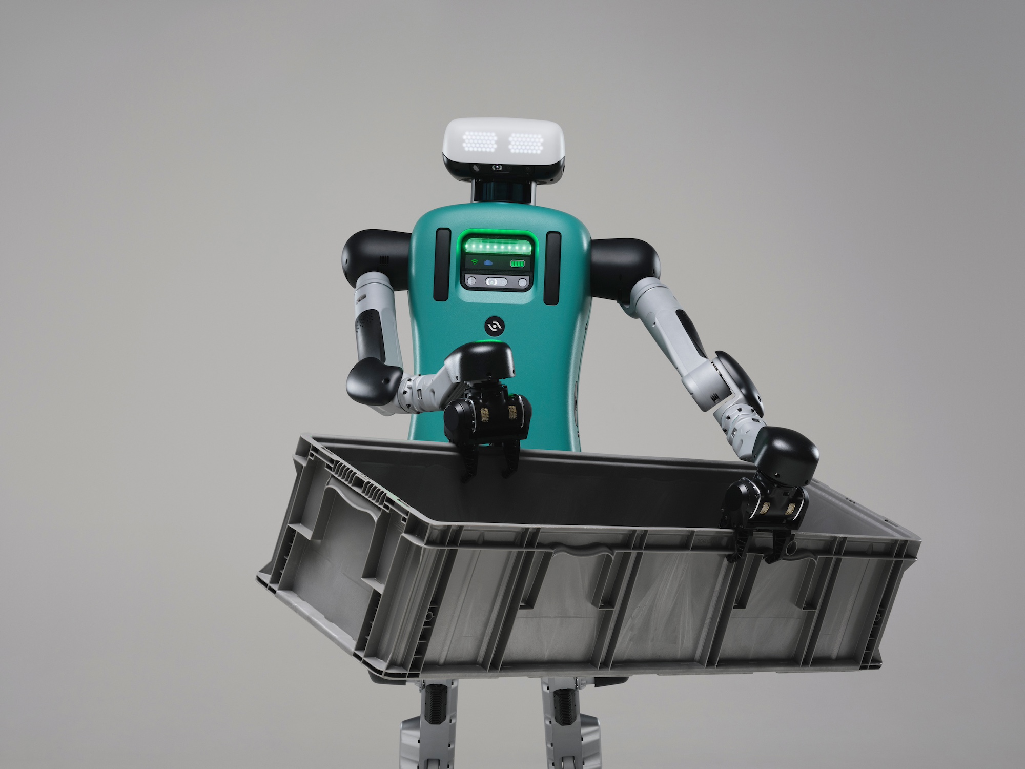 Studio photograph of Digit holding a large plastic tote