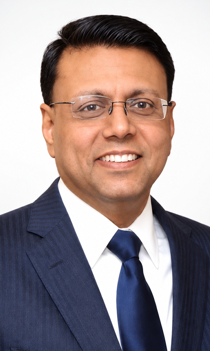 Sandeep Kishore, Agivant founder and CEO, in a navy suit