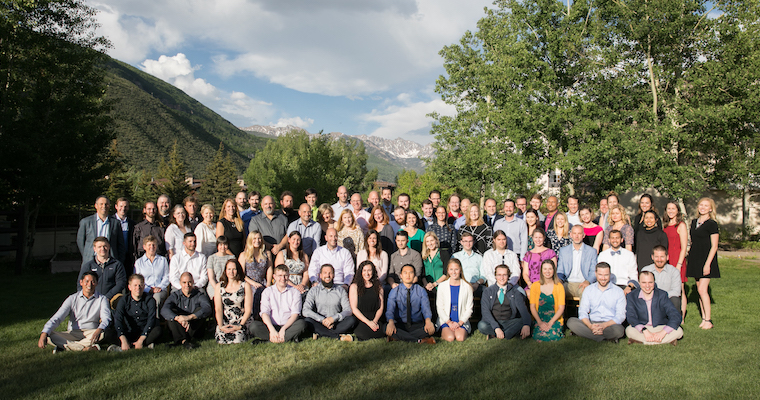 Aha! employees gathered for a group photograph outdoors