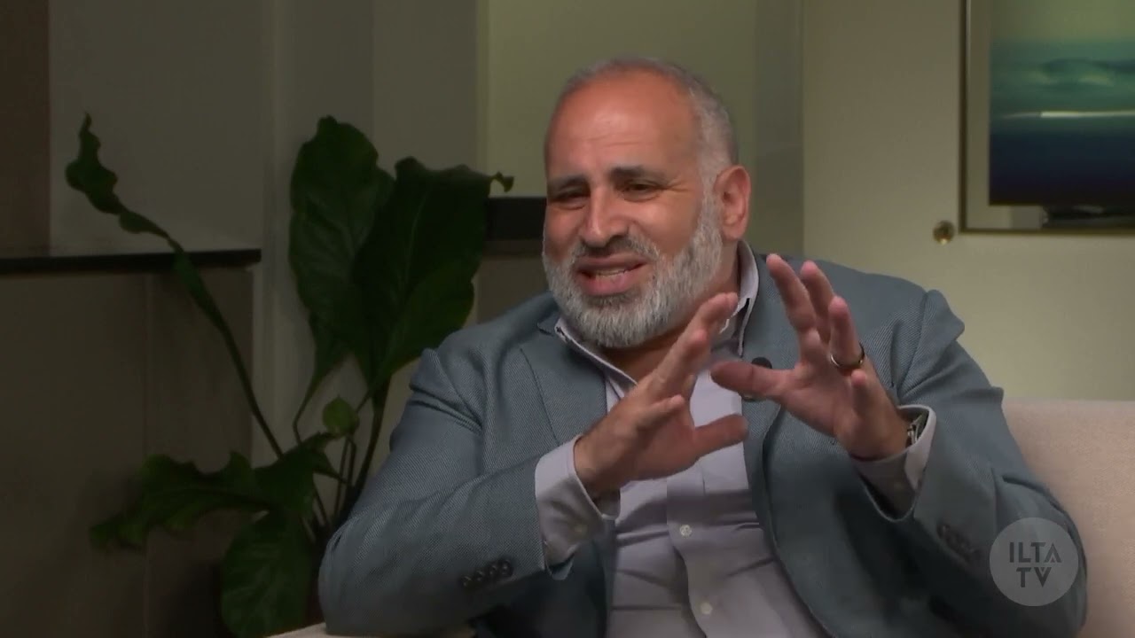 Ahmed Shaaban gesturing during his ILTACON TV interview in 2023