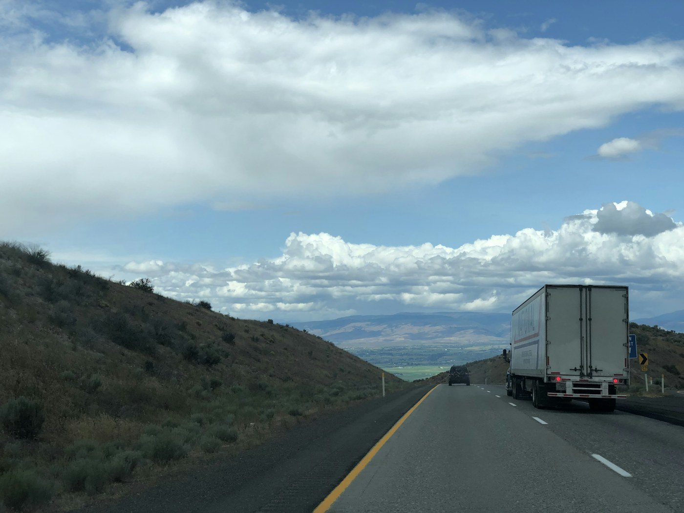 Freight truck traveling on a highway in Washington state