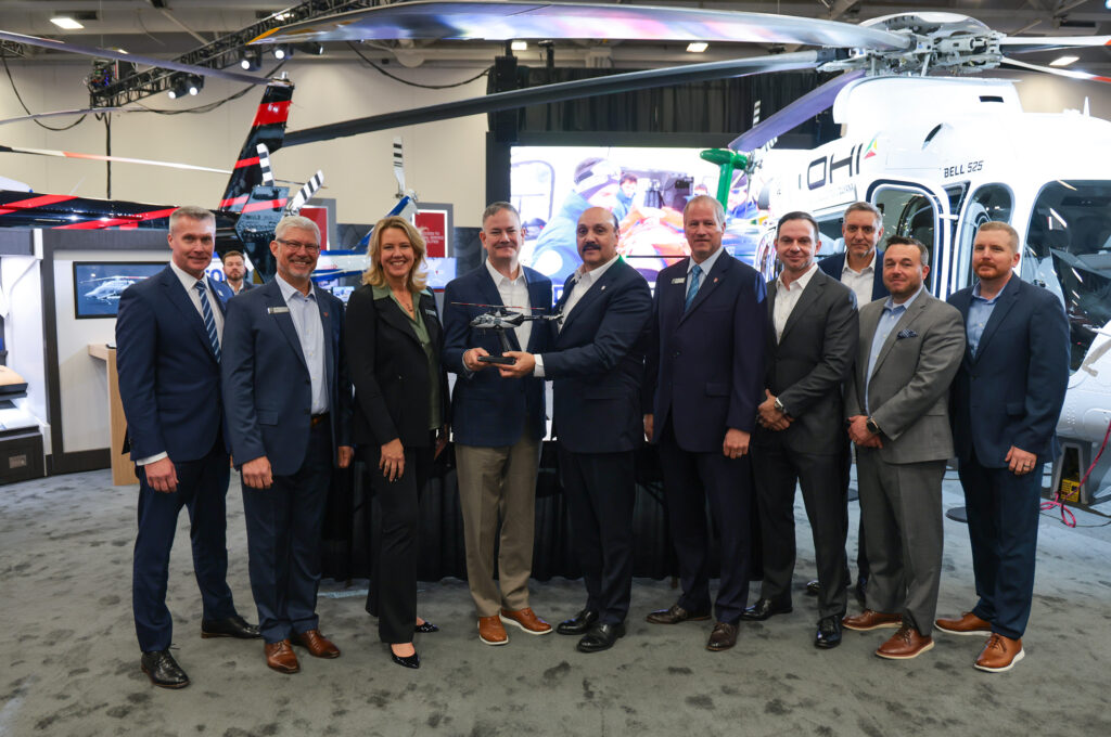 Air Methods and Bell representatives at their aircraft purchase signing ceremony at VERTICON 2025