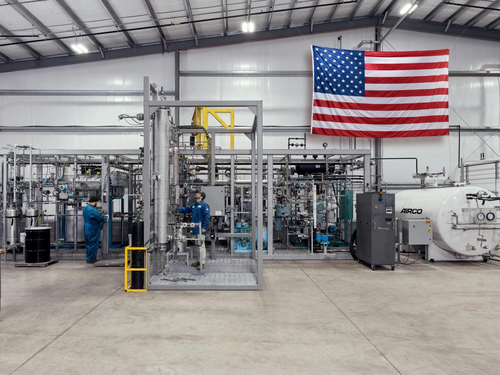 Two AIRCO workers among fuel-production equipment in the photograph accompanying its Pennsylvania facility announcement
