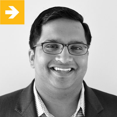 Black-and-white press photograph of Ajay Shah used in Harvey Mudd’s 2026 alumni feature