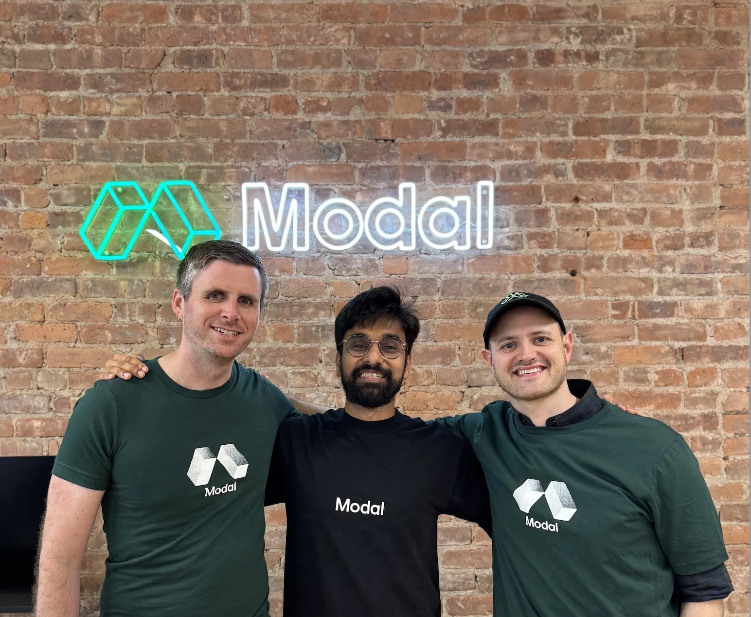 Paul Butler, Akshat Bubna, and Taylor Baldwin standing together at Modal