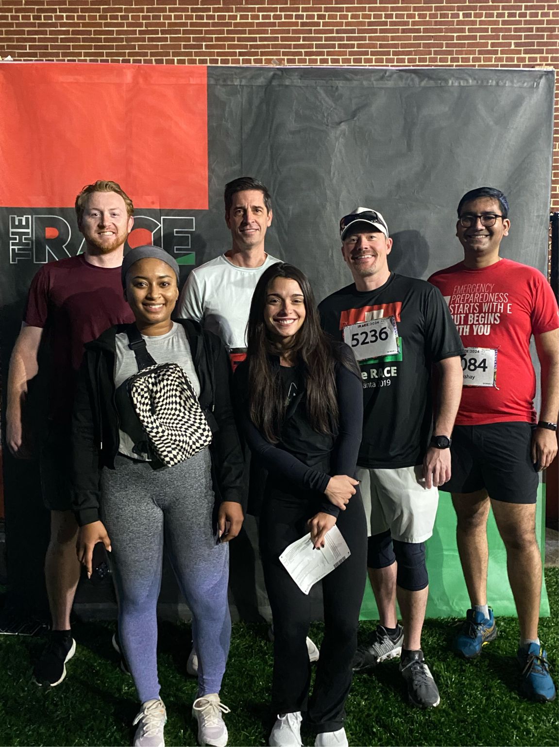 Akshay Birla, at right in a red shirt, with Juvare colleagues after The Race 2024 in Atlanta