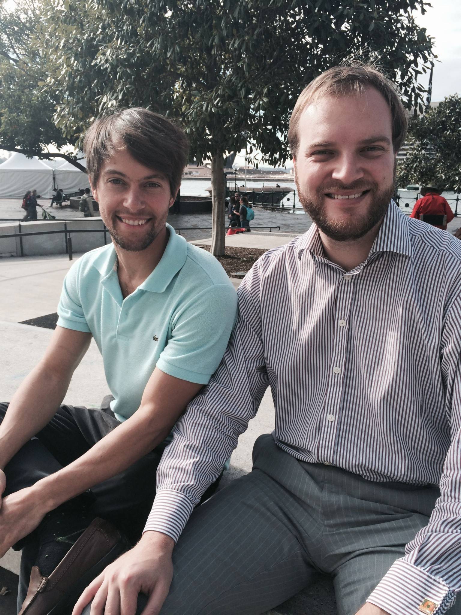 Al Bentley at left, seated outdoors with co-founder Nick van den Berg