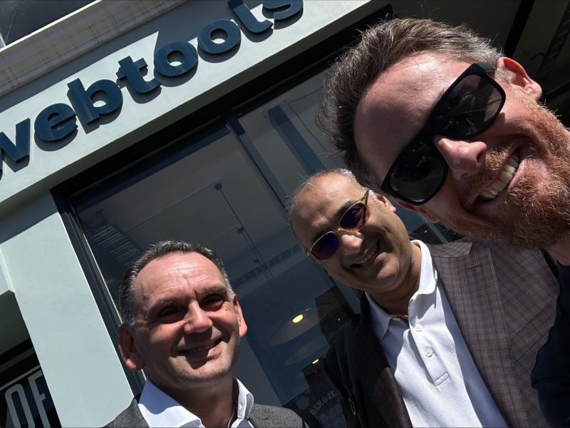 Al Lalji and colleagues taking a selfie outside Webtools in New Zealand