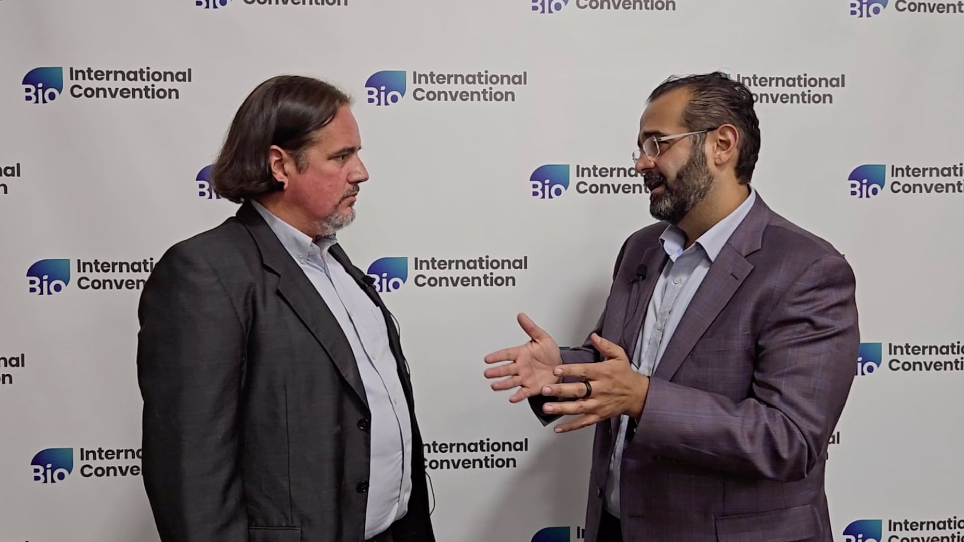 Alaa Halawa, right, speaking with a BiotechTV interviewer at the BIO International Convention