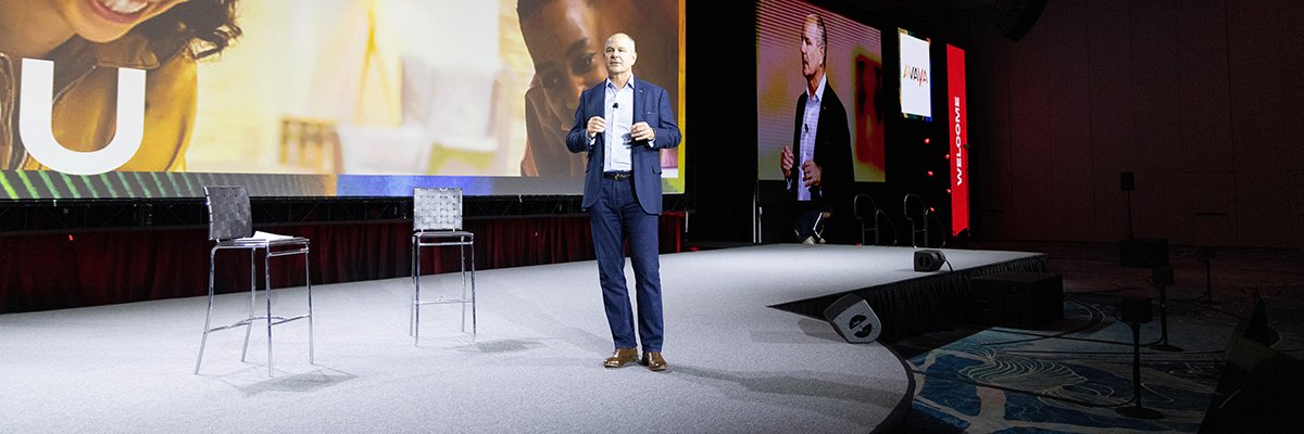 Alan Masarek speaking on stage at Avaya ENGAGE 2023