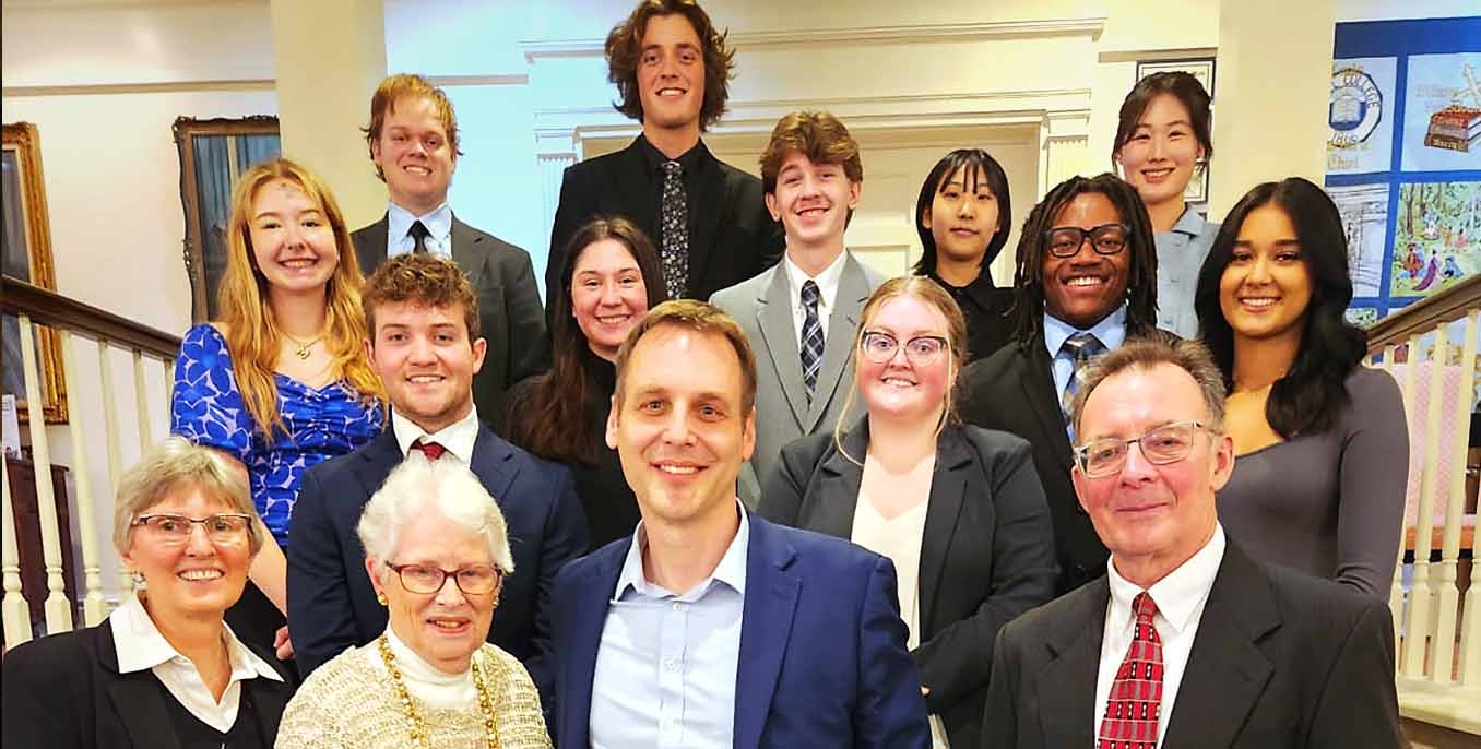 Alan Shepard, front center, with students and attendees at Thiel College's Senior Business Seminar