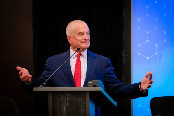 Alan Walts speaking at a lectern during a Termeer Fellows event